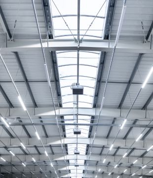 Electrical Handiwork On A Warehouse Ceiling